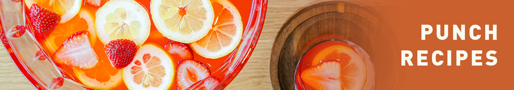 Punch Recipes. Punch bowl with lemons and strawberries.